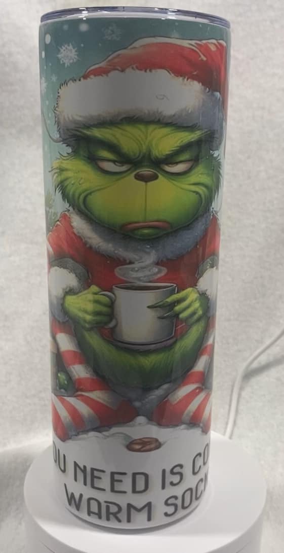 20 oz Grinch warm socks Tumbler