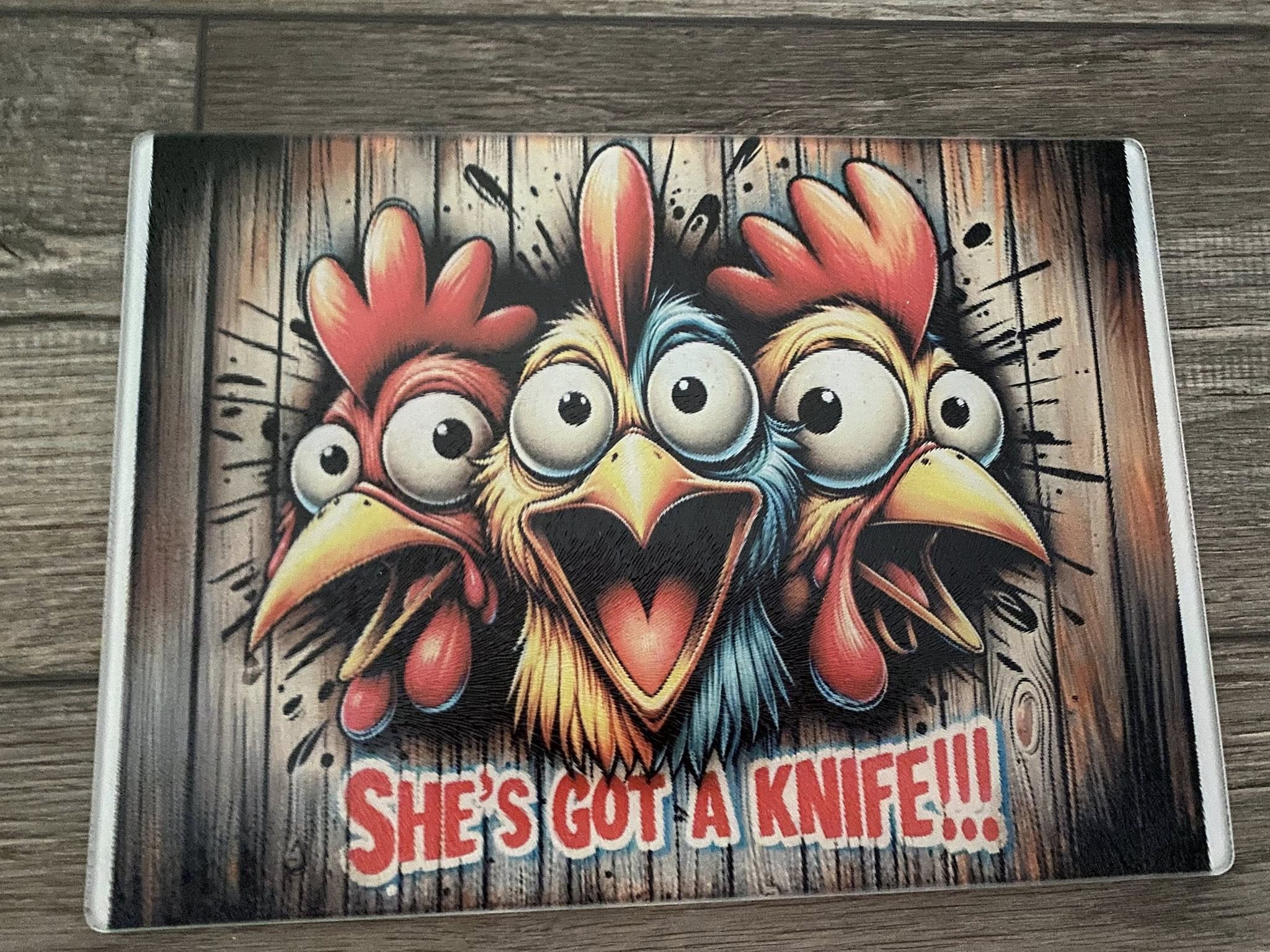 SHE'S GOT A KNIFE CHICKEN CUTTING BOARDS